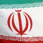 FILE PHOTO: The Iranian flag flies in front of the