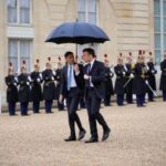 French President Macron and Britain’s Prime Minister Sunak attend a